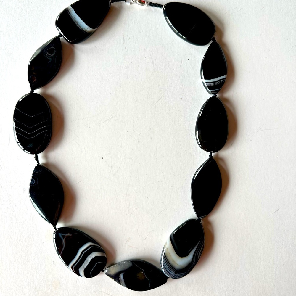 Never worn beautiful 24 inch black and white lace agate necklace NWT. Price firm